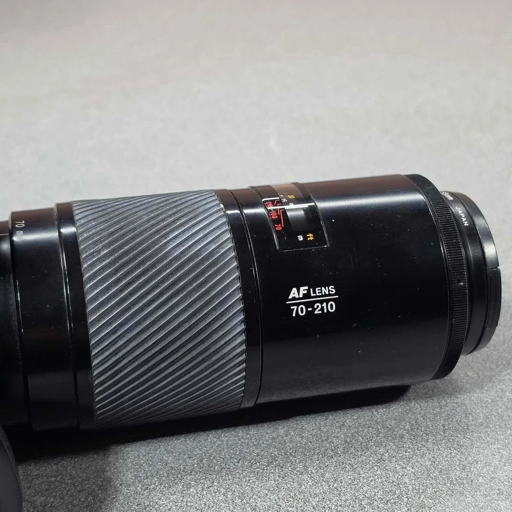 Minolta Maxxum 70 SLR Film Camera 35mm Excellent 70-210mm f/4.5-5.6 lens Works.